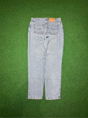 Levis 550 Womens 16 Vintage 90s Relaxed 35x32 Light Wash Wide Leg Tapered Jeans